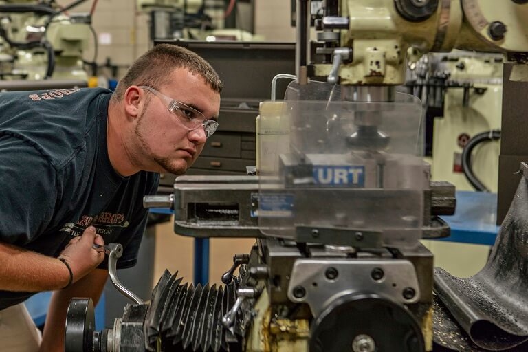 guy working on machine in lab