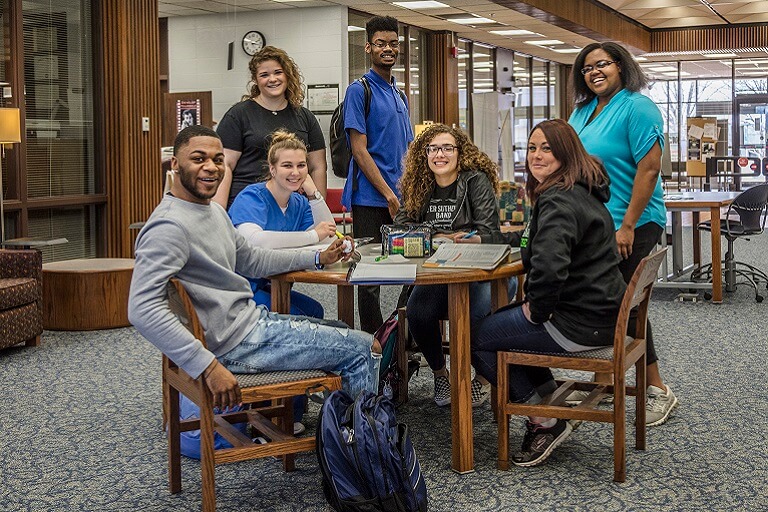Students sitting in library